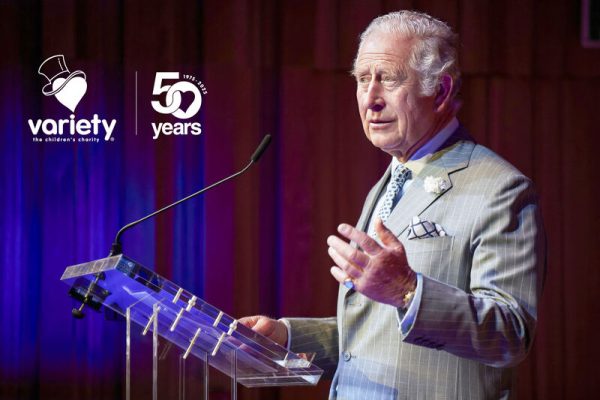 HM King Charles speaks at podium